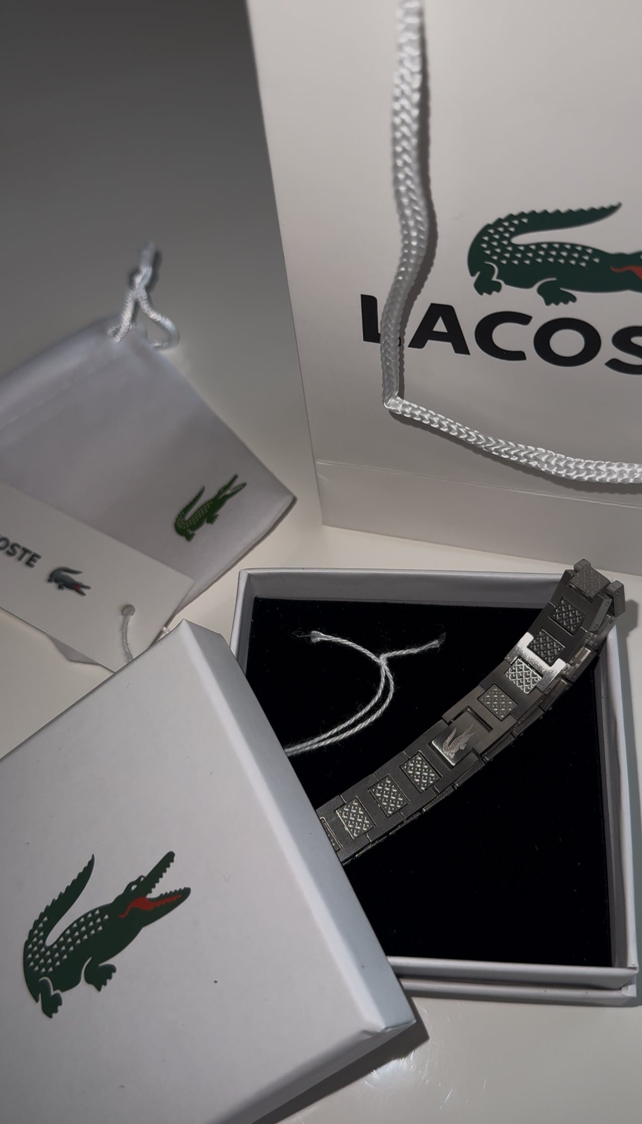 Lacoste bracelet with bag and box silver